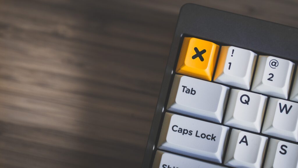 Close-up of the delete button on a keyboard.