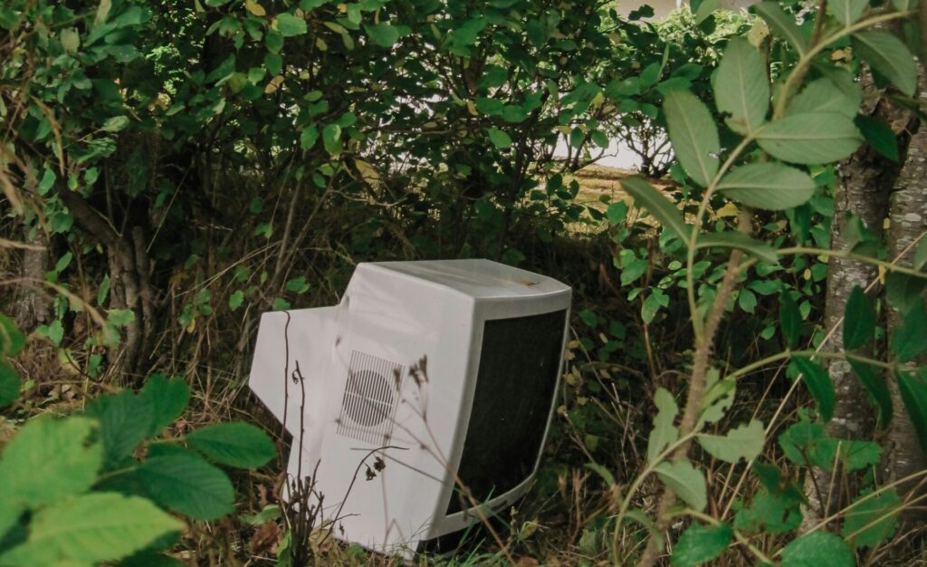 Safely Dispose of old tech: computer in the woods