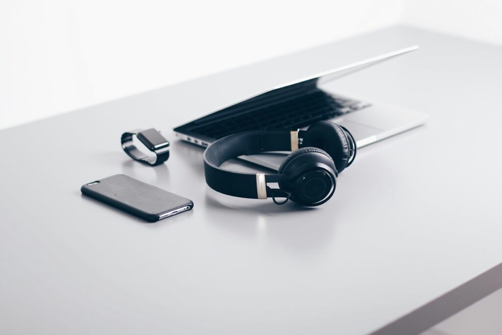 Electronics on a white table.