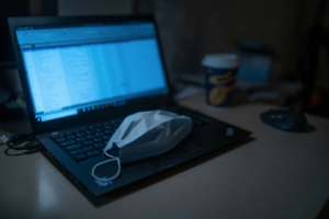 Medical mask on a windows laptop.