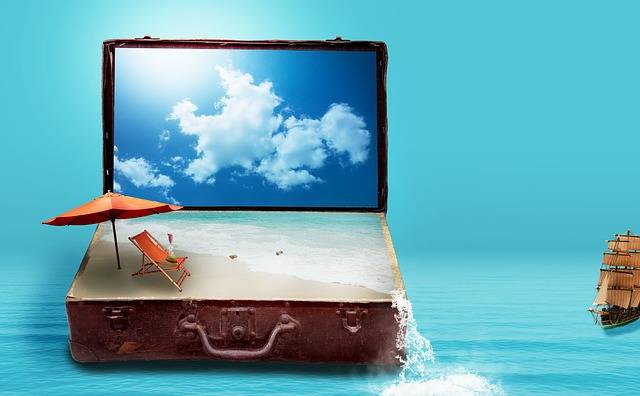 A beach inside a suitcase graphic