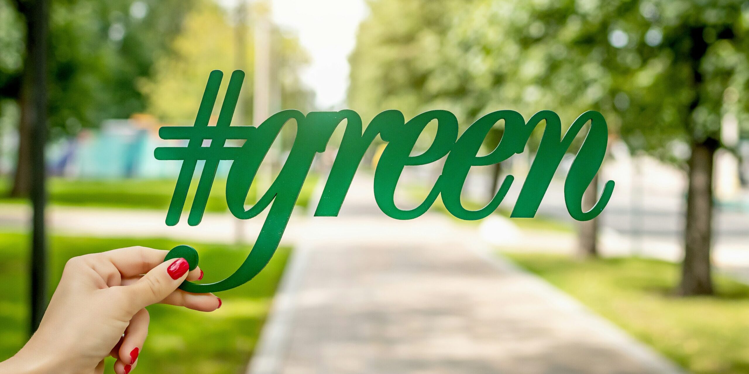 Redding E-waste recycling: hand holding a #green sign.