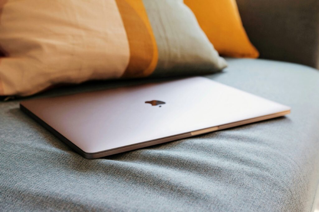 Fair Oaks MacBook Repair: MacBook laptop on bed