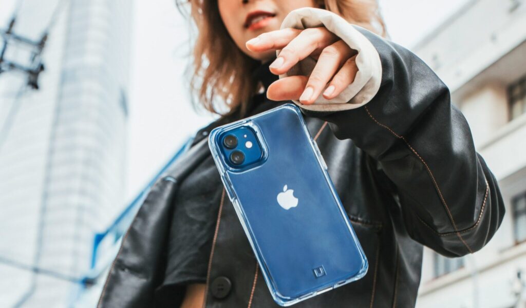 Mobile Device: Woman Dropping iPhone