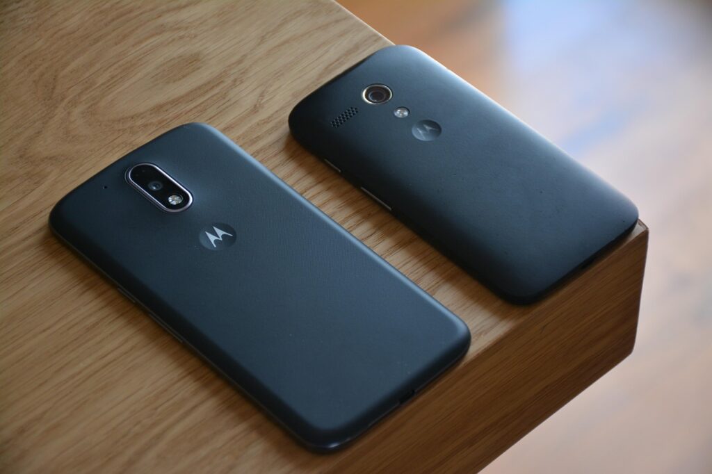 Two Motorola phones face down