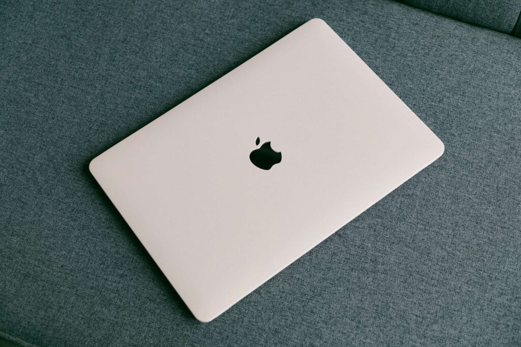 A MacBook Air on a canvas surface
