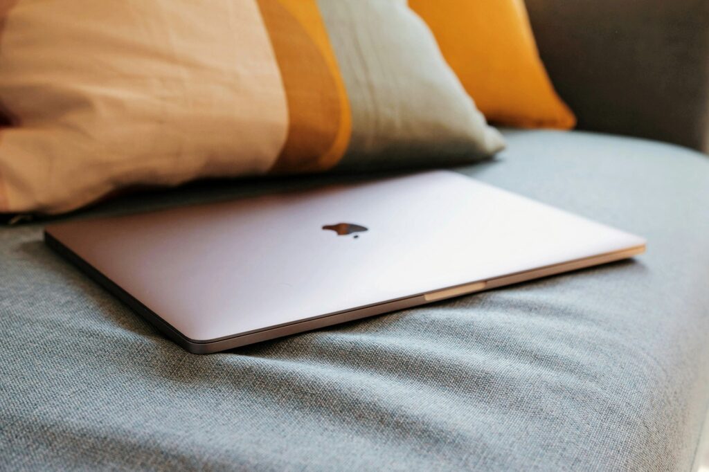 MacBook on a couch