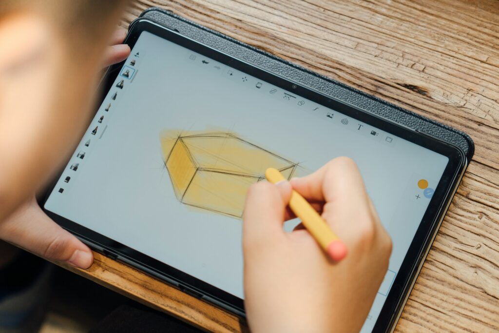 Person using a pencil on a Samsung Galaxy Tablet