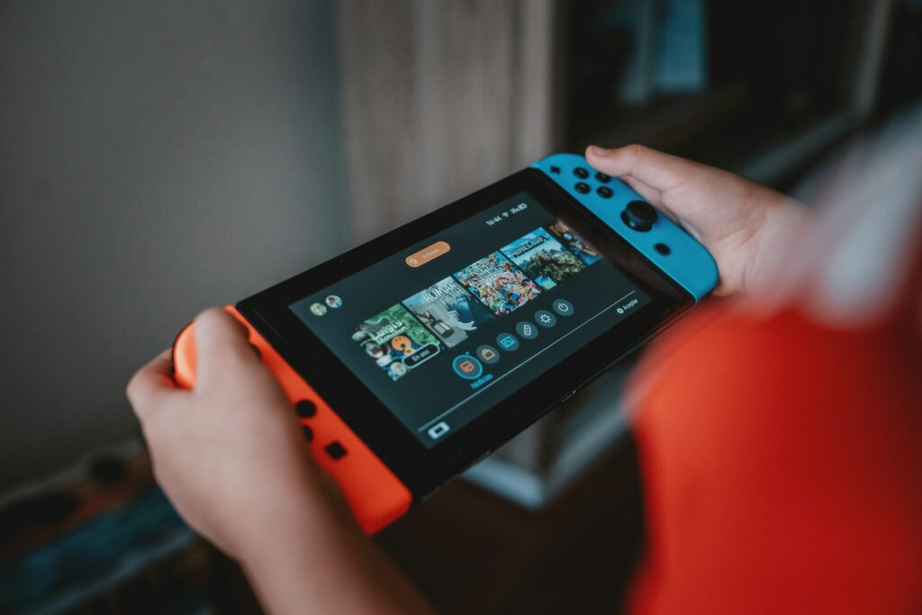 A person playing on a Nintendo Switch