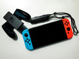 Nintendo Switch Repair Chico: Nintendo switch and controller on white background